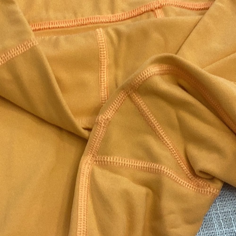 Athleta Orange Stash Pocket Leggings - Picture 3 of 4